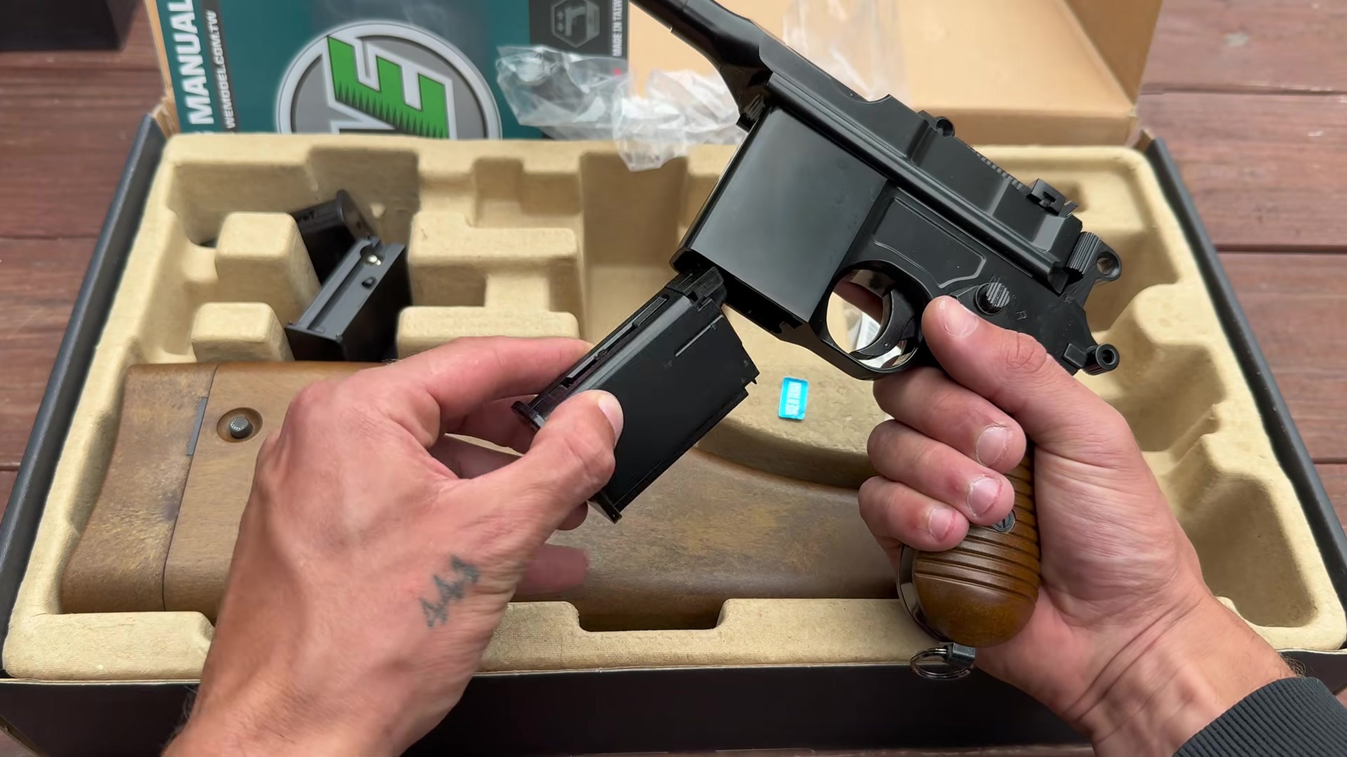 am-i-got-the-iconic-full-auto-broomhandle-used-on-the-3.jpg